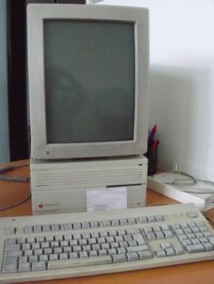 A photo of a Macinstosh IIci with its signature vertical CRT.